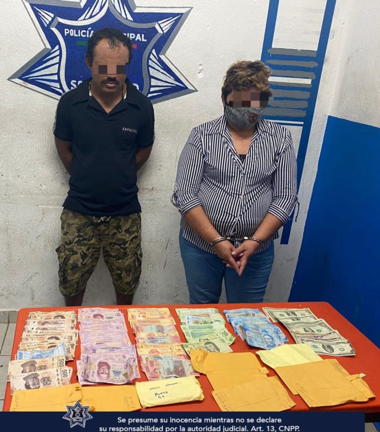 Cae pareja de presuntos extorsionadores con 22 mil pesos en Playa del Carmen