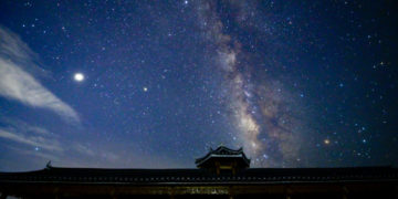 CONGJIANG, CHINA - AUGUST 12, 2021 - Photo taken on Aug. 12, 2021 shows the Perseid meteor shower over Miao Village in Congjiang County, Southwest China's Guizhou Province. (Photo credit should read Costfoto/Future Publishing via Getty Images)