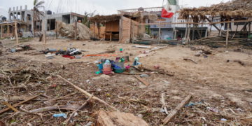 A view of a beach covered in rubbish and debris in the aftermath of Hurricane Agatha, in Zipolite, Oaxaca state, Mexico, June 1, 2022. REUTERS/Jose de Jesus Cortes
