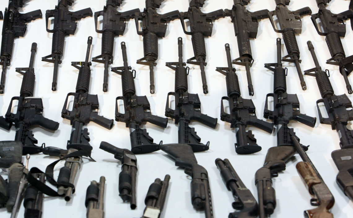Guns sit on display during a presentation of arms captured in an operation against the Gulf cartel in Mexico City, Friday, Nov. 7, 2008. The Army said that military officials seized 540 guns during a raid in the border city of Reynosa, Mexico on Thursday, the largest arsenal seized of its kind in Mexico's history. (AP Photo/Gregory Bull)