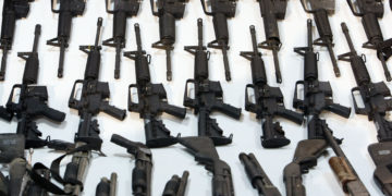 Guns sit on display during a presentation of arms captured in an operation against the Gulf cartel in Mexico City, Friday, Nov. 7, 2008. The Army said that military officials seized 540 guns during a raid in the border city of Reynosa, Mexico on Thursday, the largest arsenal seized of its kind in Mexico's history. (AP Photo/Gregory Bull)